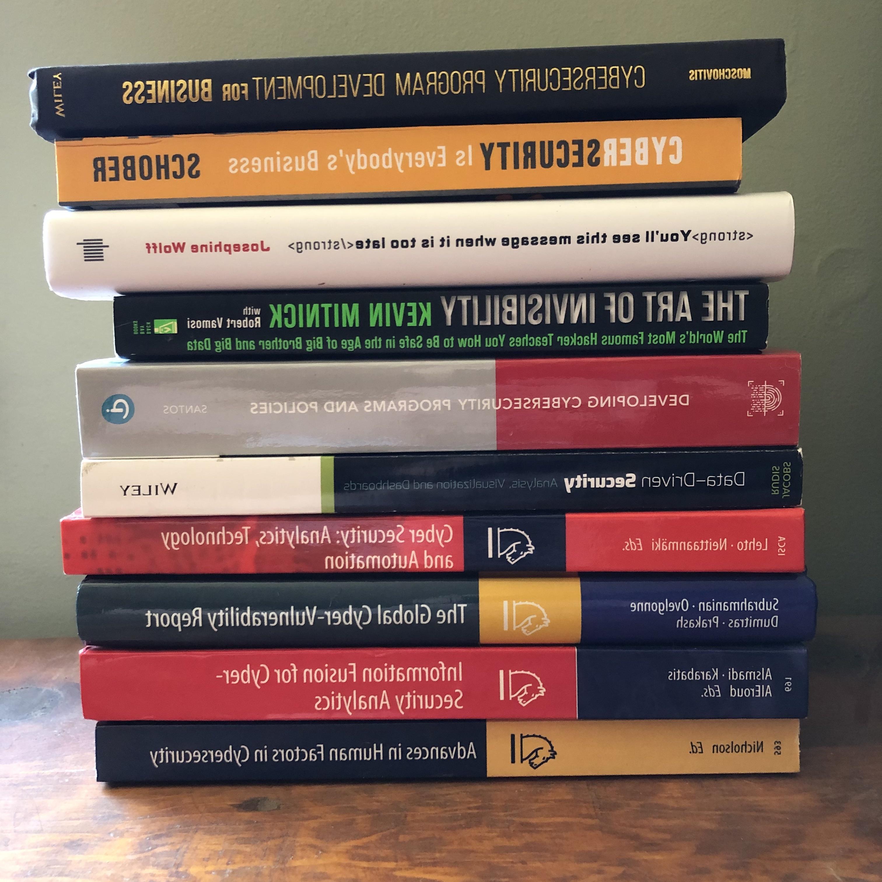 Stack of cybersecurity books
