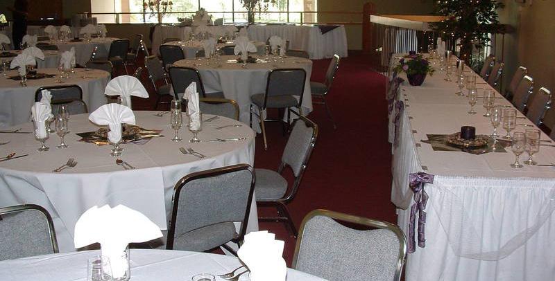 Hero Image of ballroom tables prepared for dinner